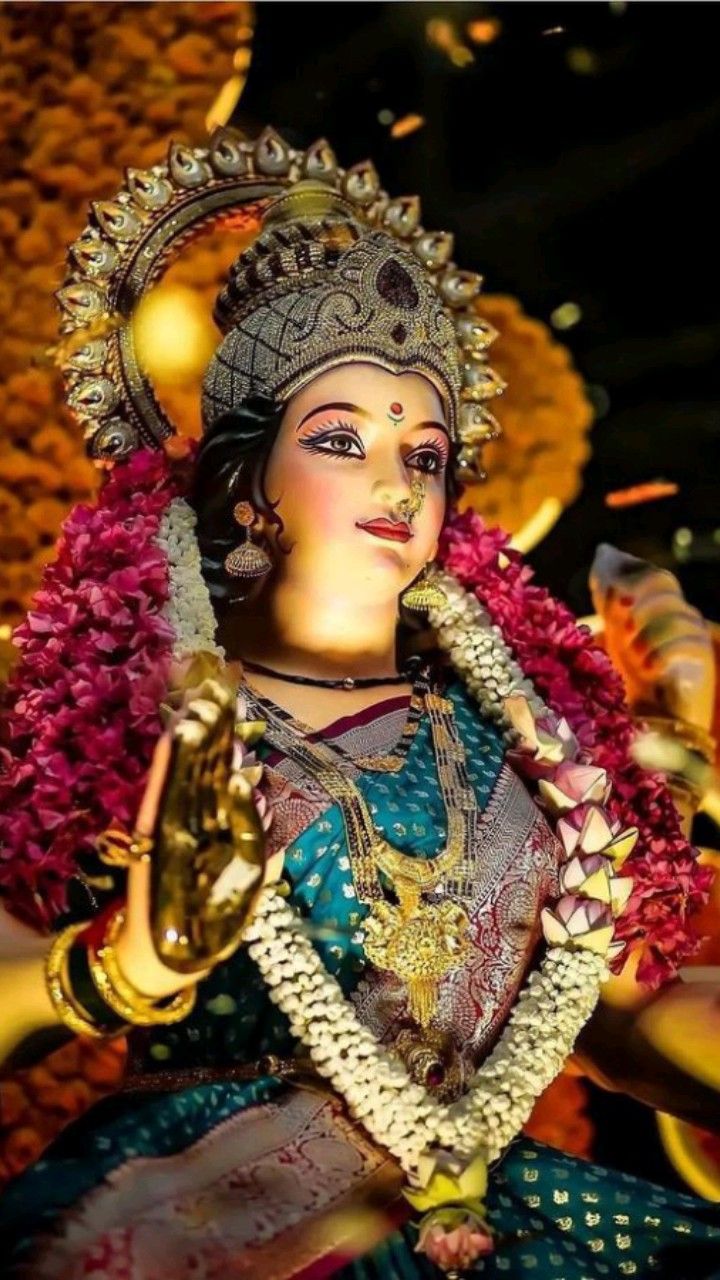 Radiant Ambe Maa with floral garland