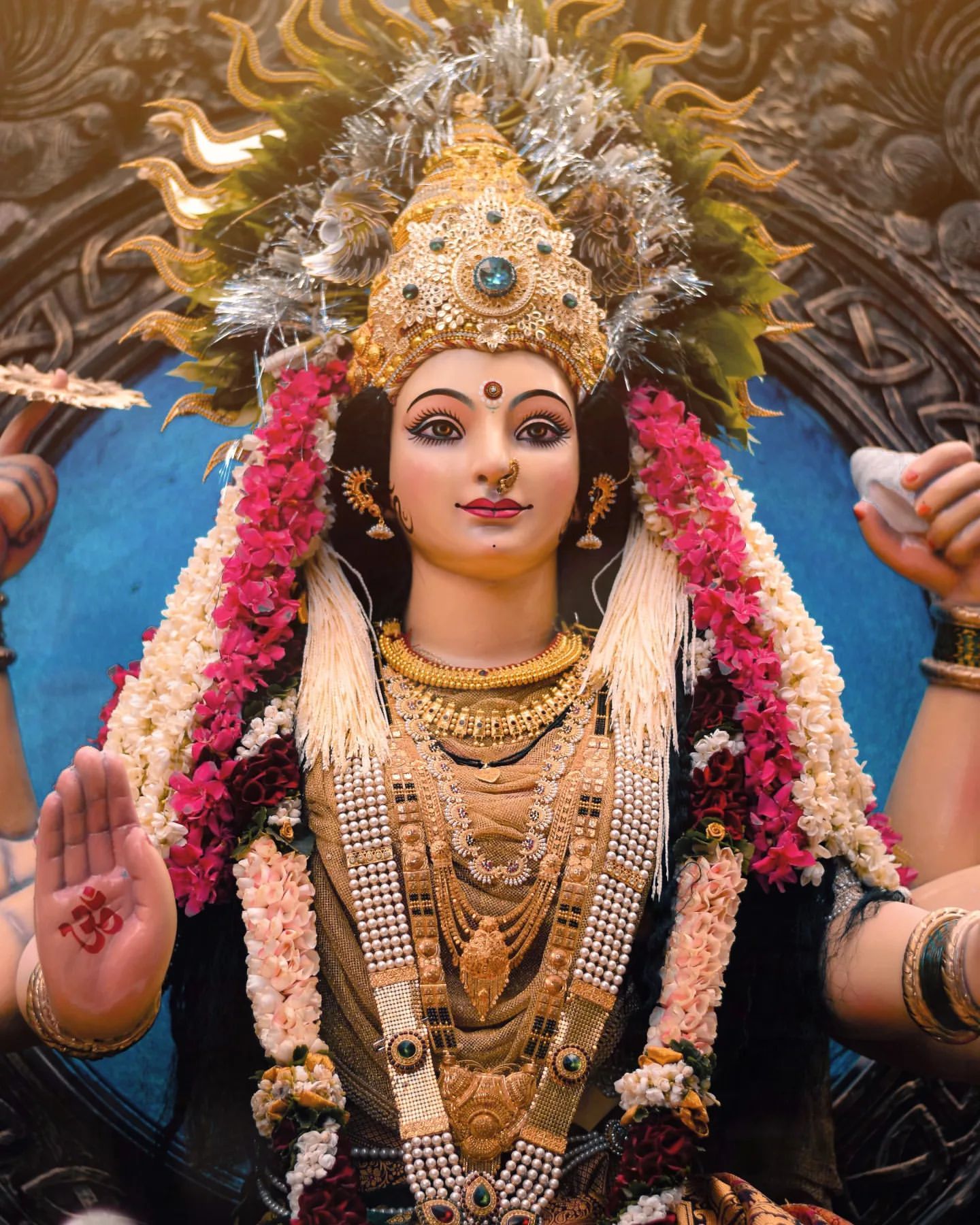 Ambe Maa bestows a gentle blessing.