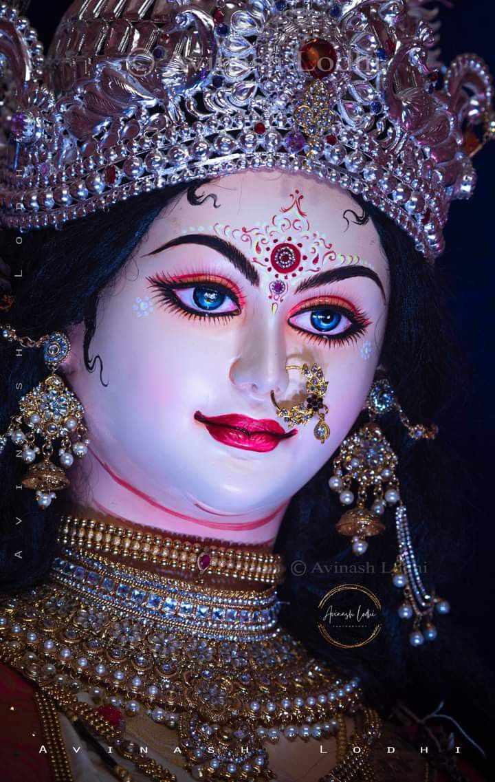 Close-up of Ambe Maa’s radiant face