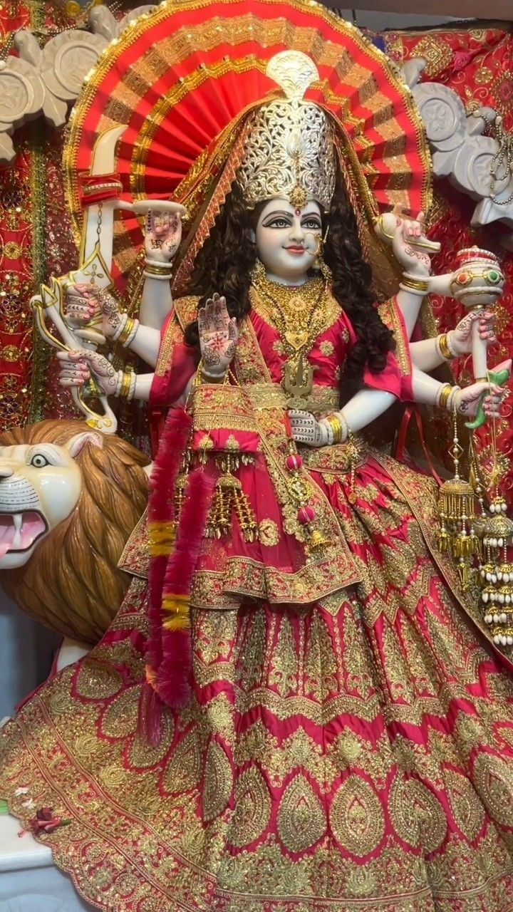 Ambe Maa with lion, powerful goddess.