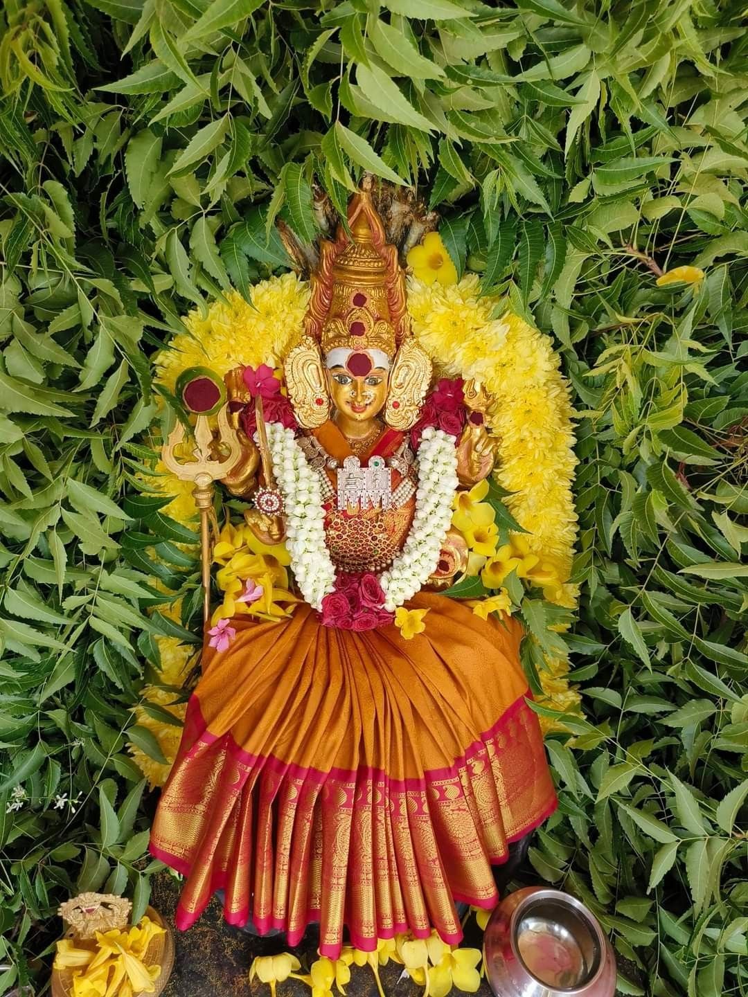 Ambe Maa adorned with yellow flowers