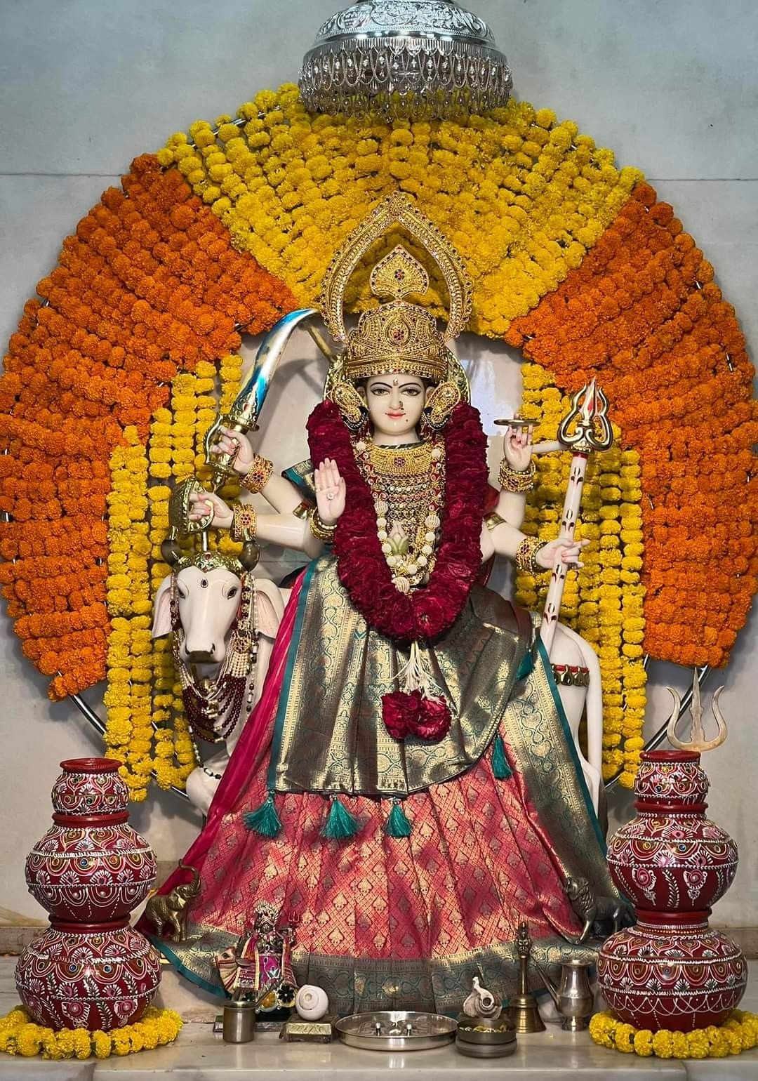 Ambe Maa adorned with marigold flowers
