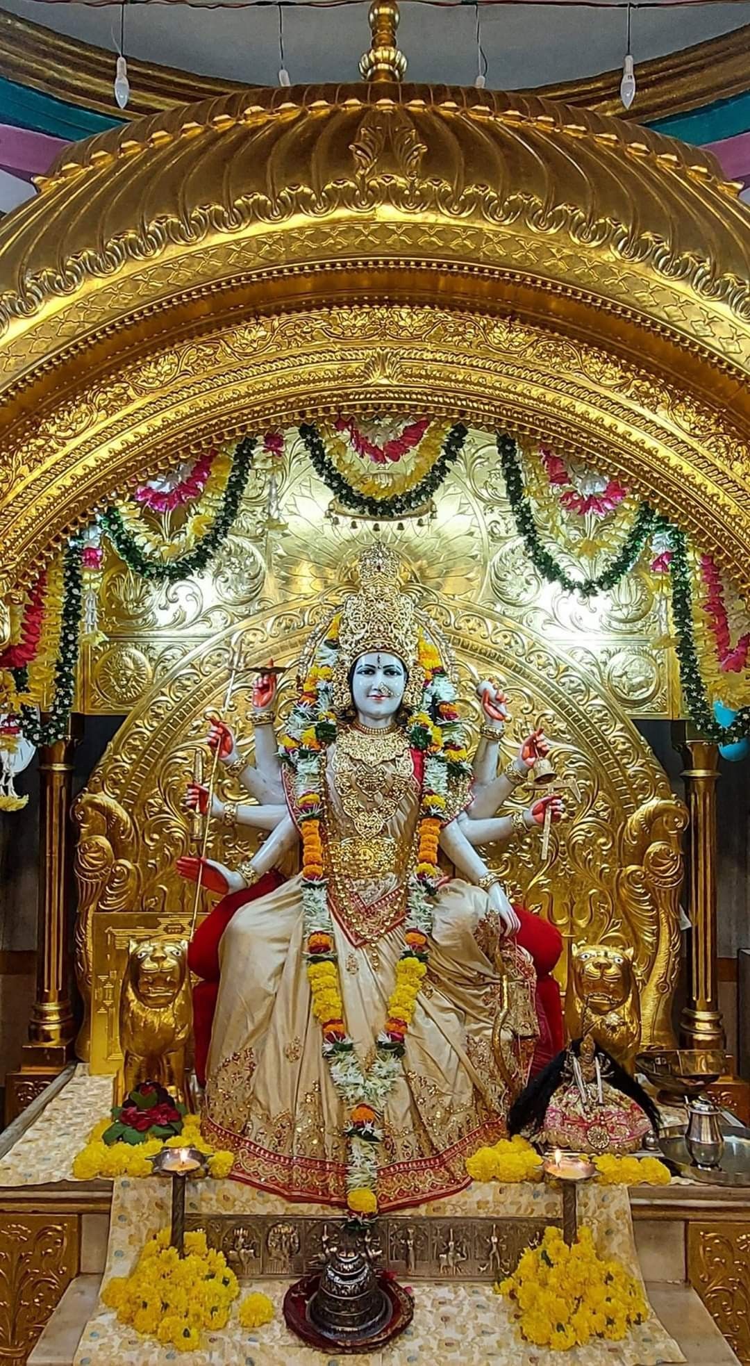 Ambe Maa seated in golden temple.