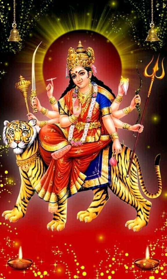 Ambe Maa riding a tiger, divine goddess.