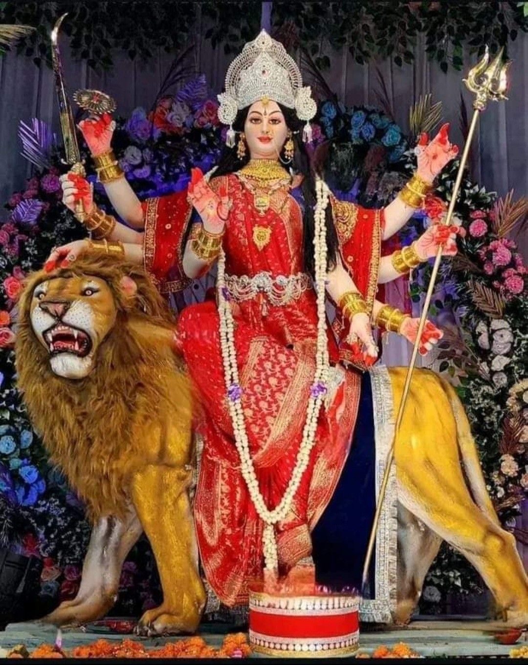 Ambe Maa riding a majestic lion
