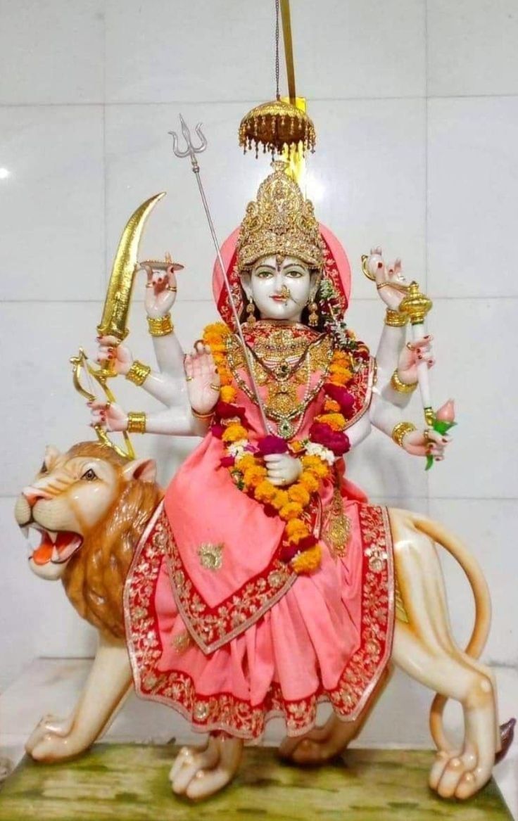 Ambe Maa riding a lion, divine statue