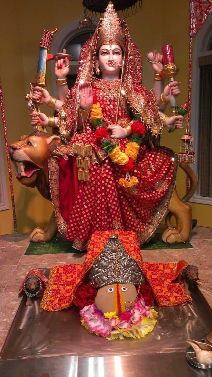 Ambe Maa seated on a lion