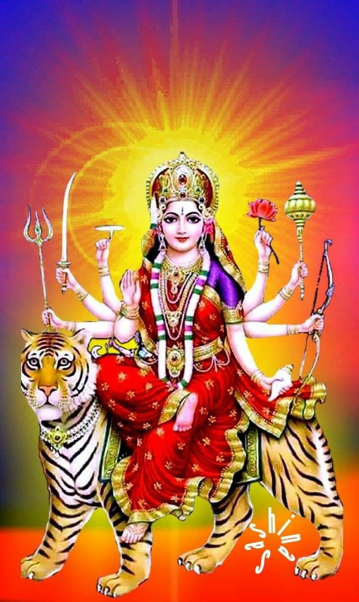 Ambe Maa riding a majestic tiger.