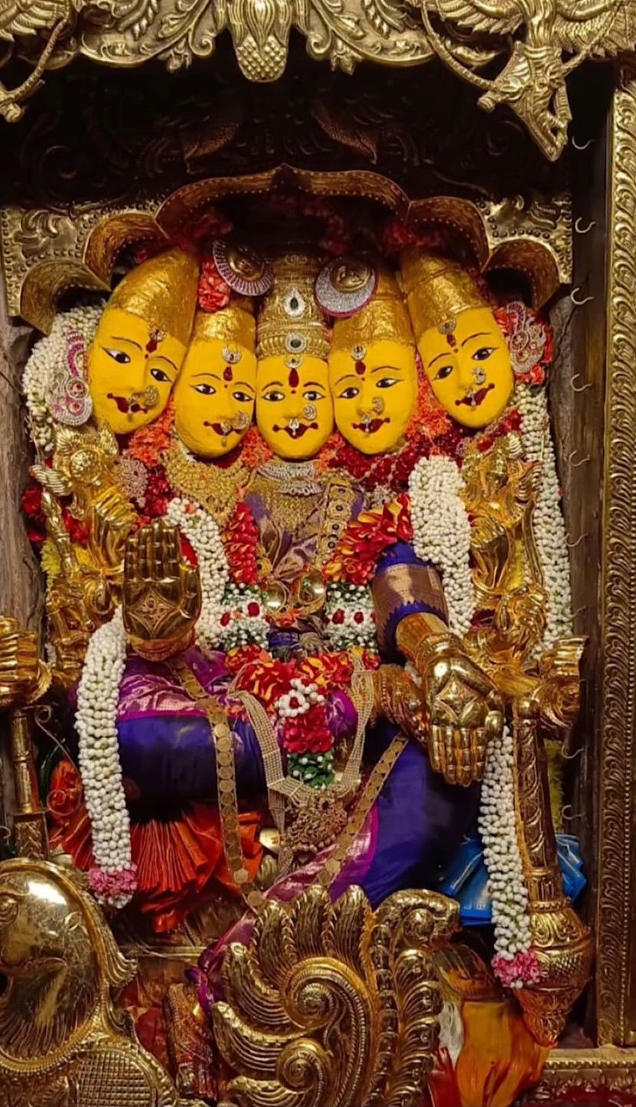 Ambe Maa with nine faces on throne