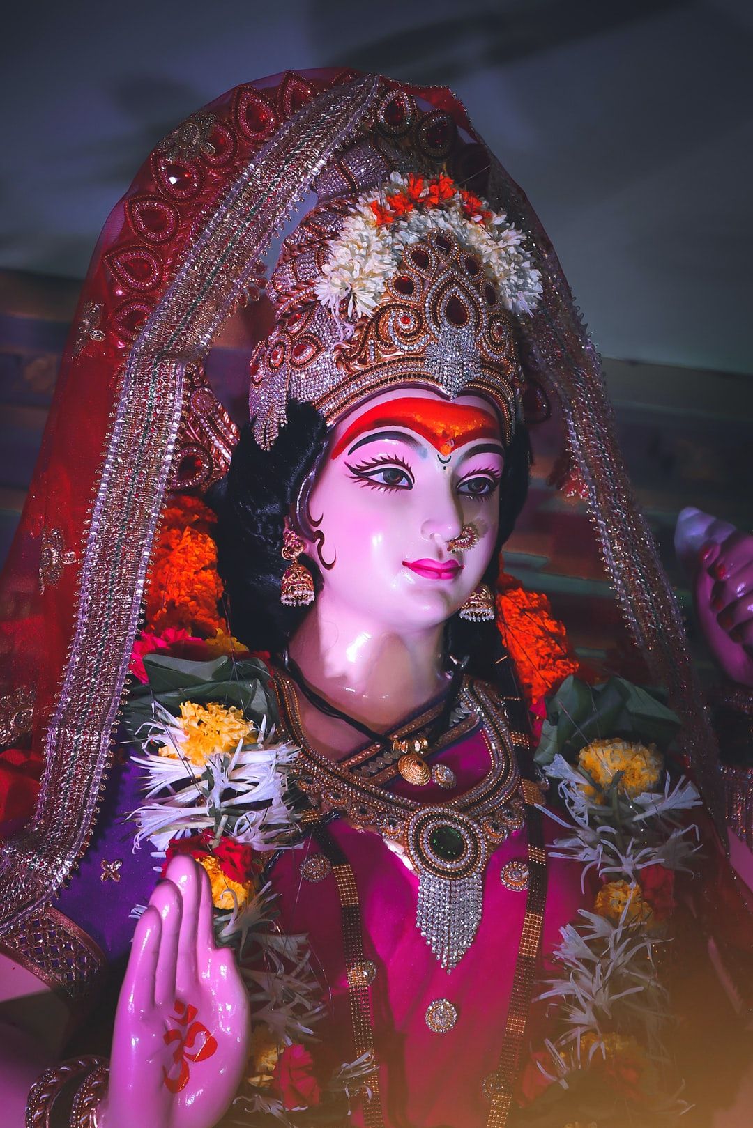 Ambe Maa radiant idol with flower garland
