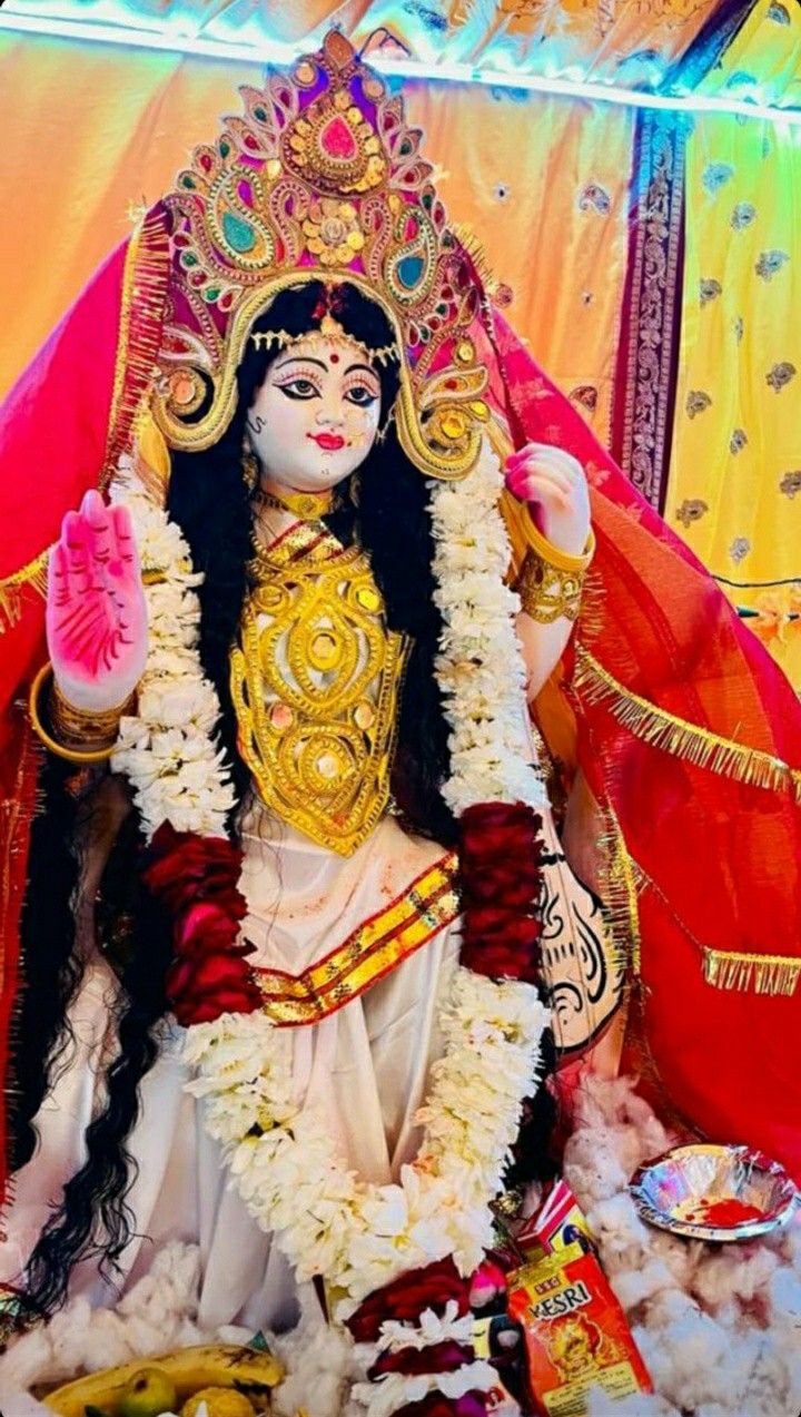 Ambe Maa adorned in radiant gold.