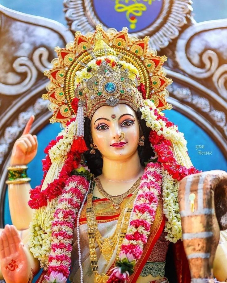 Radiant Ambe Maa adorned with flowers