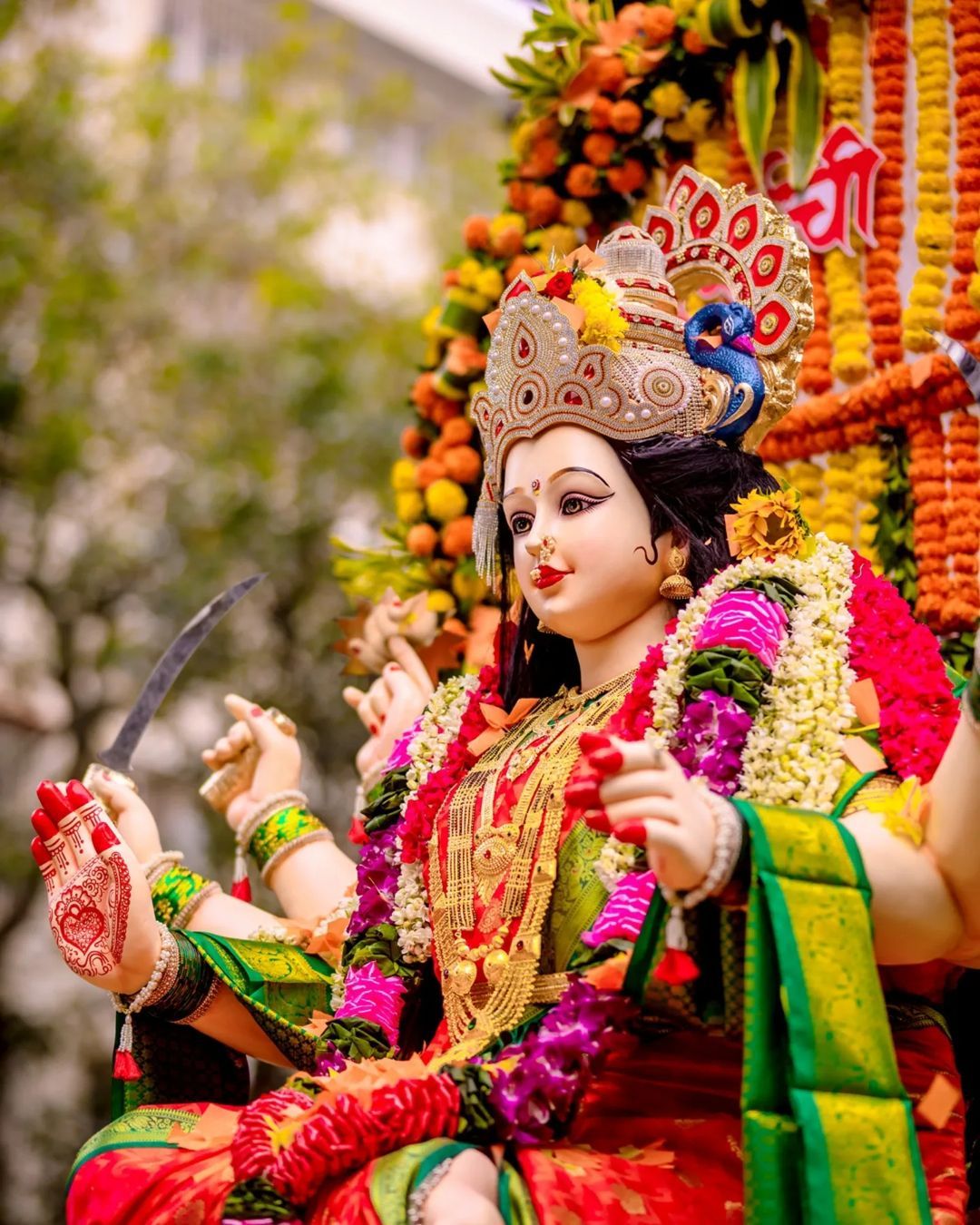 Ambe Maa adorned with flowers and jewelry