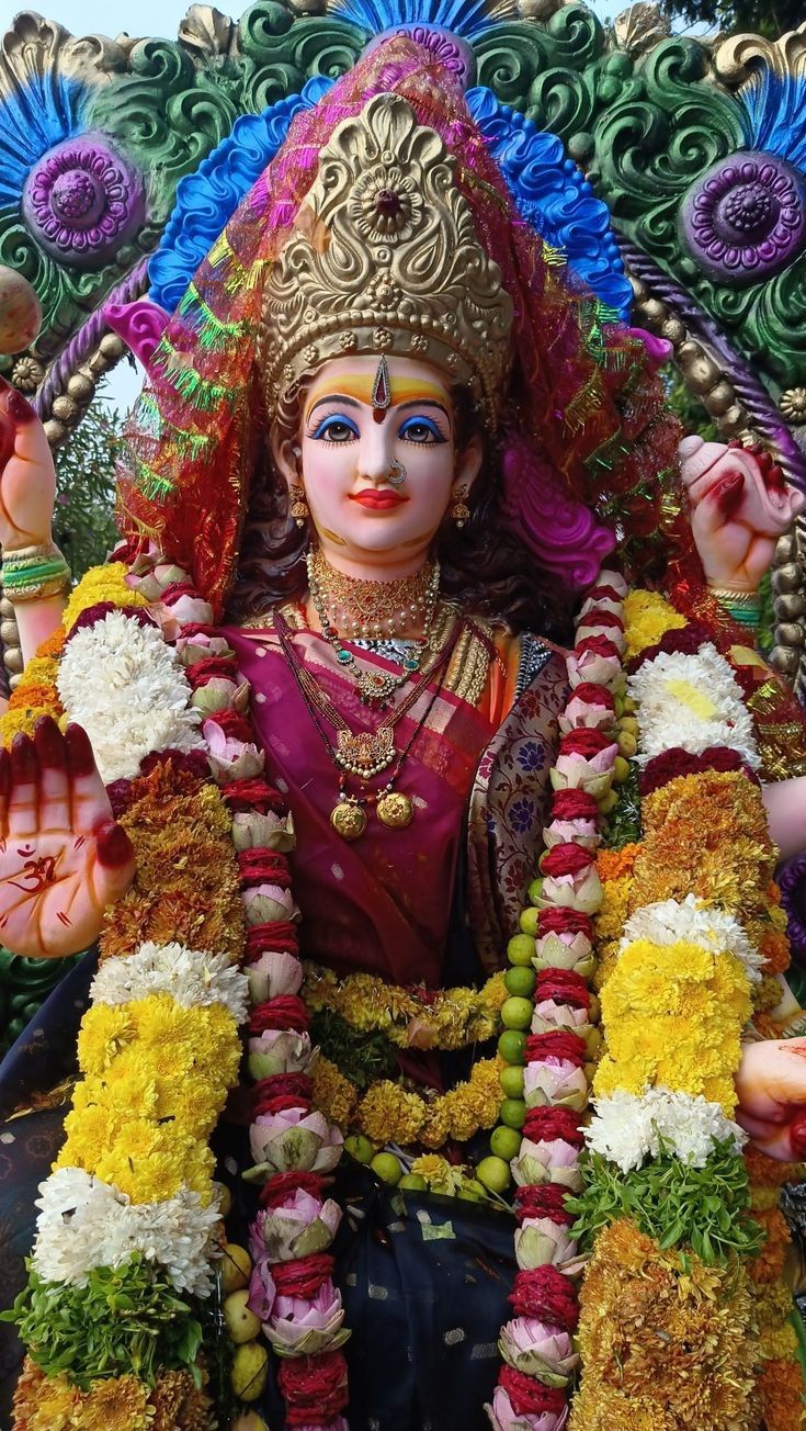 Radiant Ambe Maa adorned with flowers