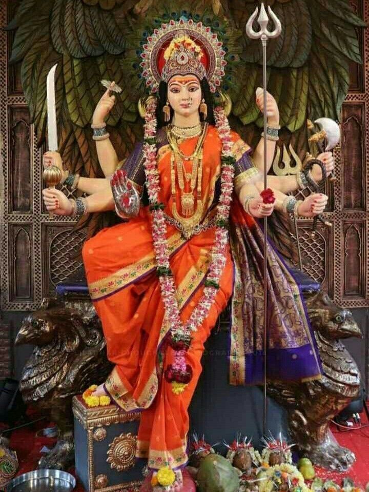 Divine Ambe Maa seated with weapons