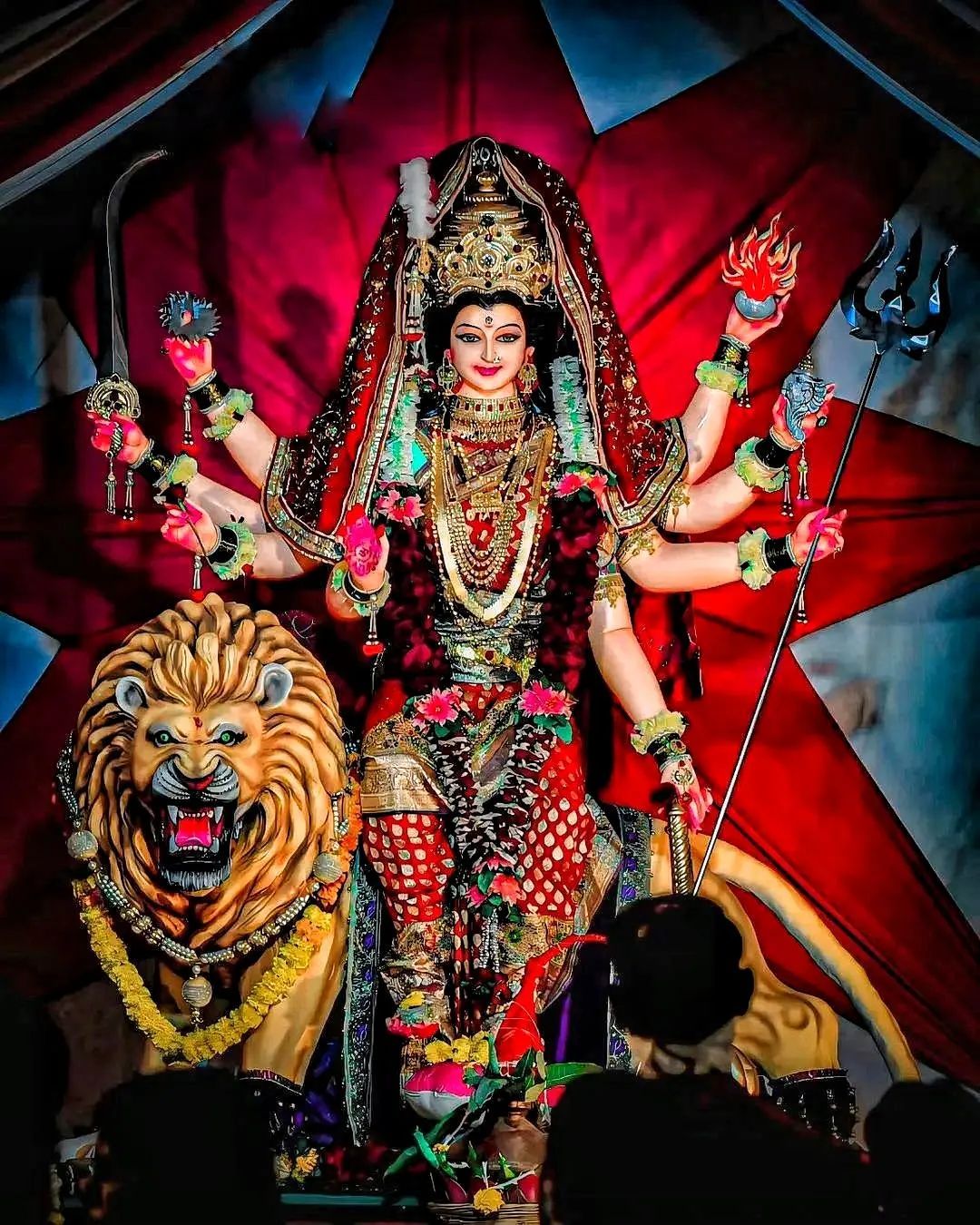 Ambe Maa seated on lion throne