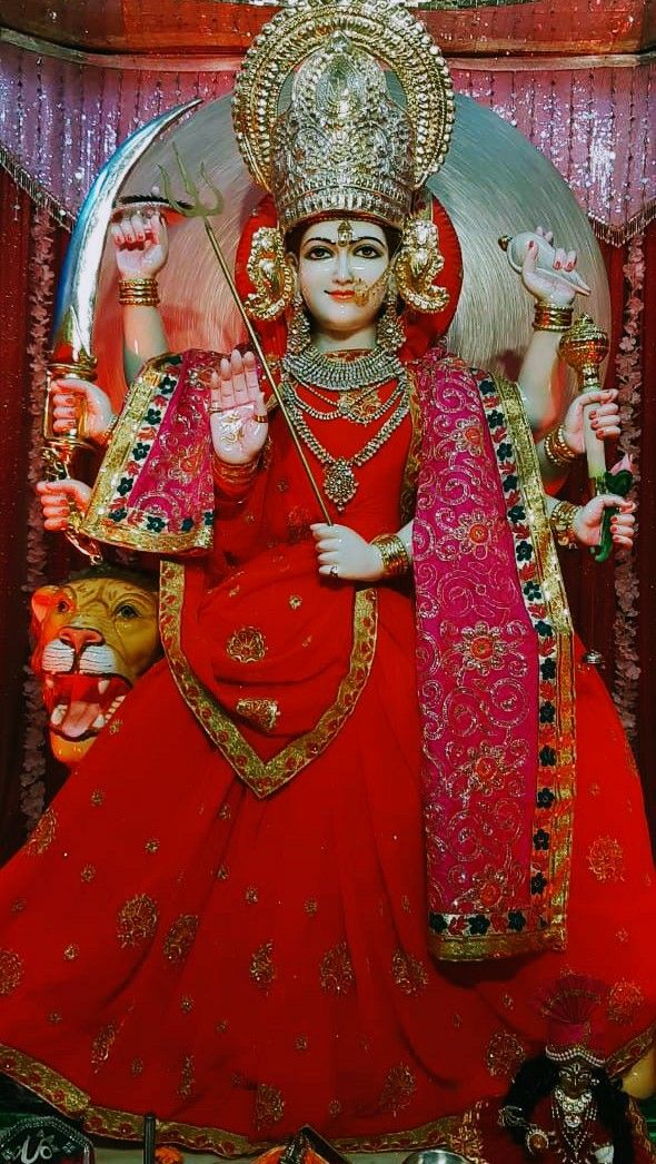 Ambe Maa with lion, trident and sword
