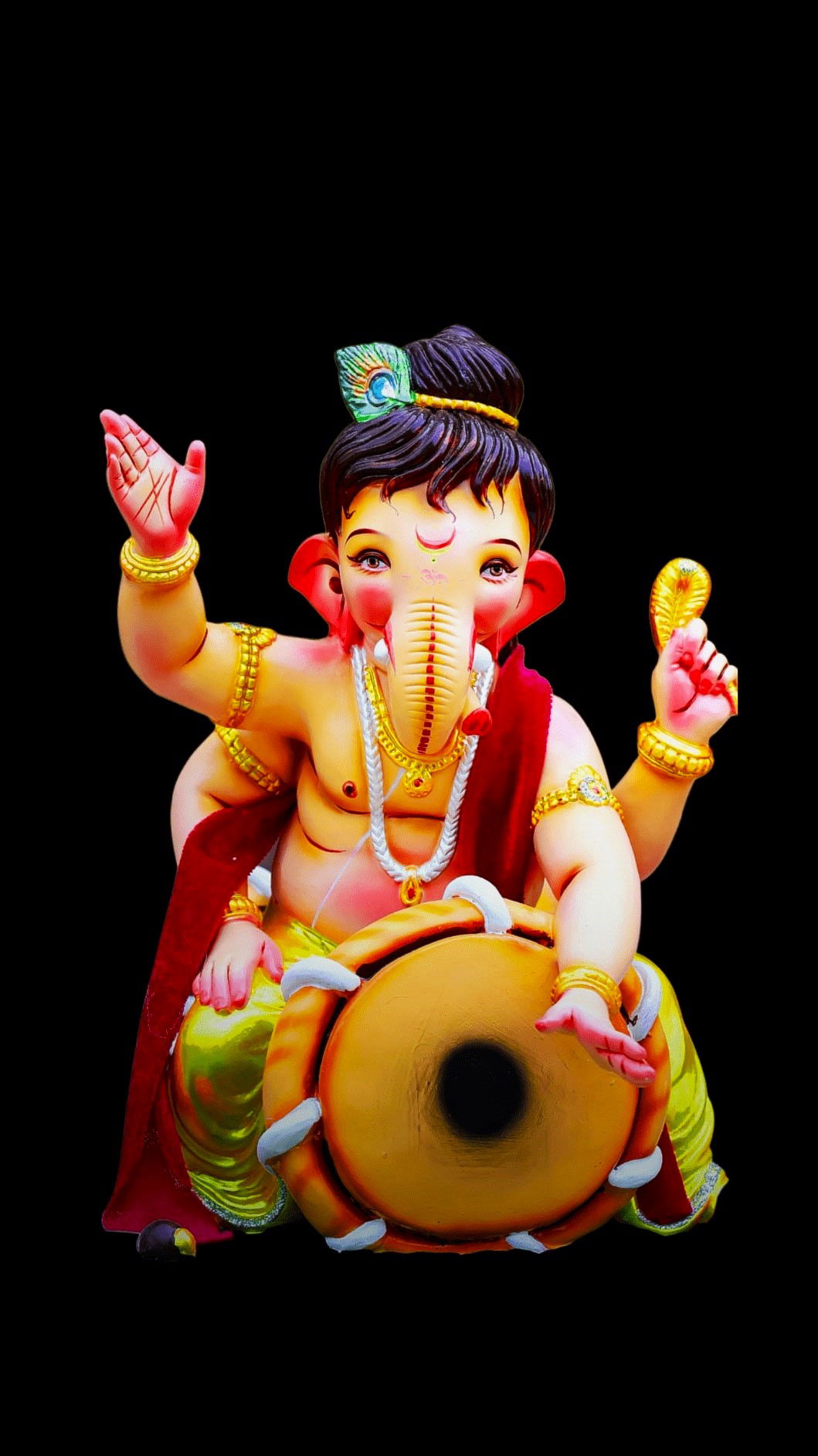 Lord Ganesha with drums and modak