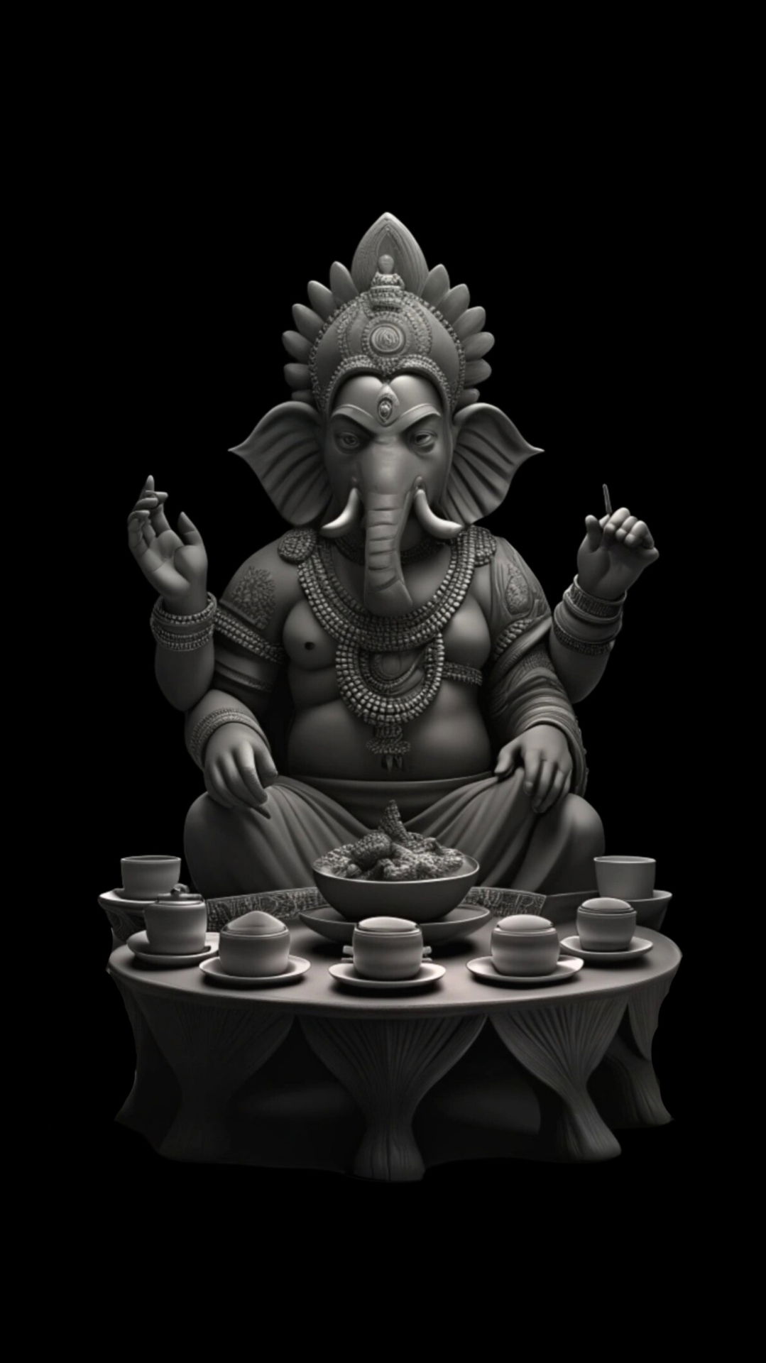 Lord Ganesha with offerings of sweets