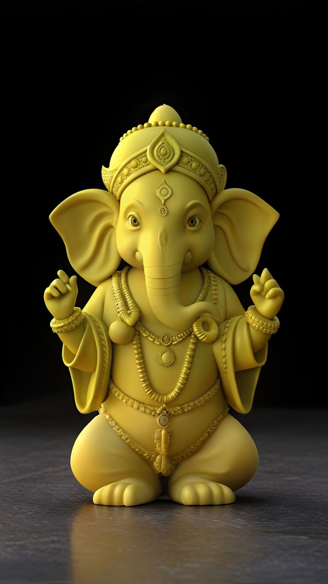 Golden Ganesha idol smiling sweetly