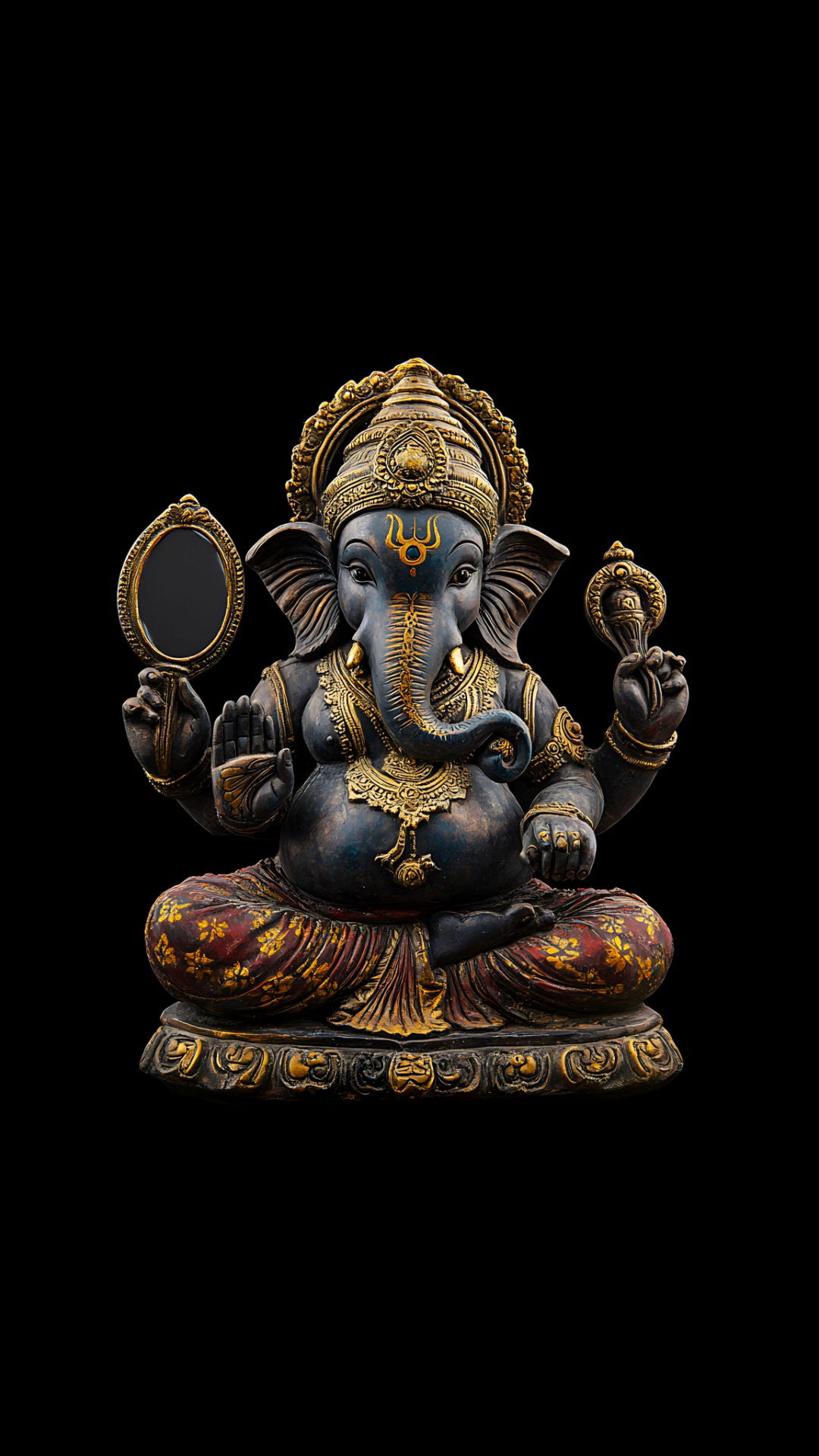 Lord Ganesha statue with gold accents