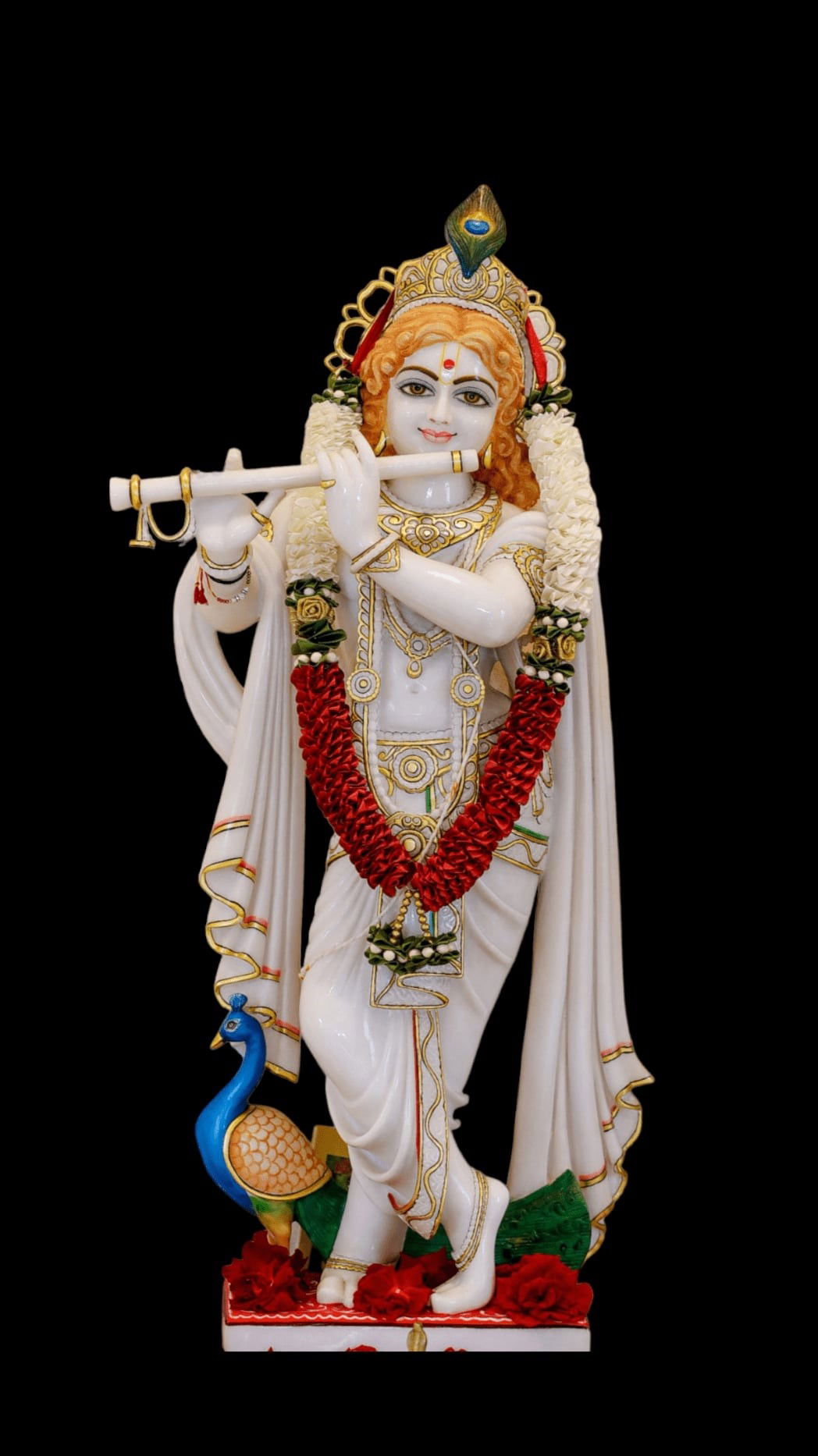 Lord Krishna playing the flute statue