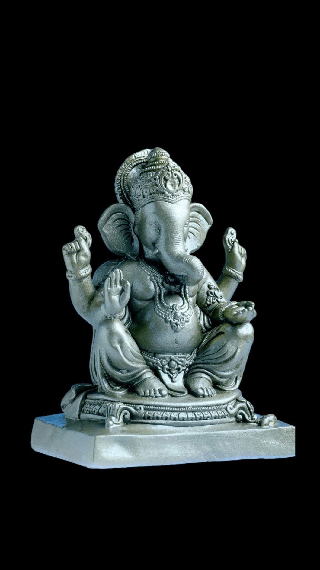 Silver Ganesha statue, blessings and prosperity.