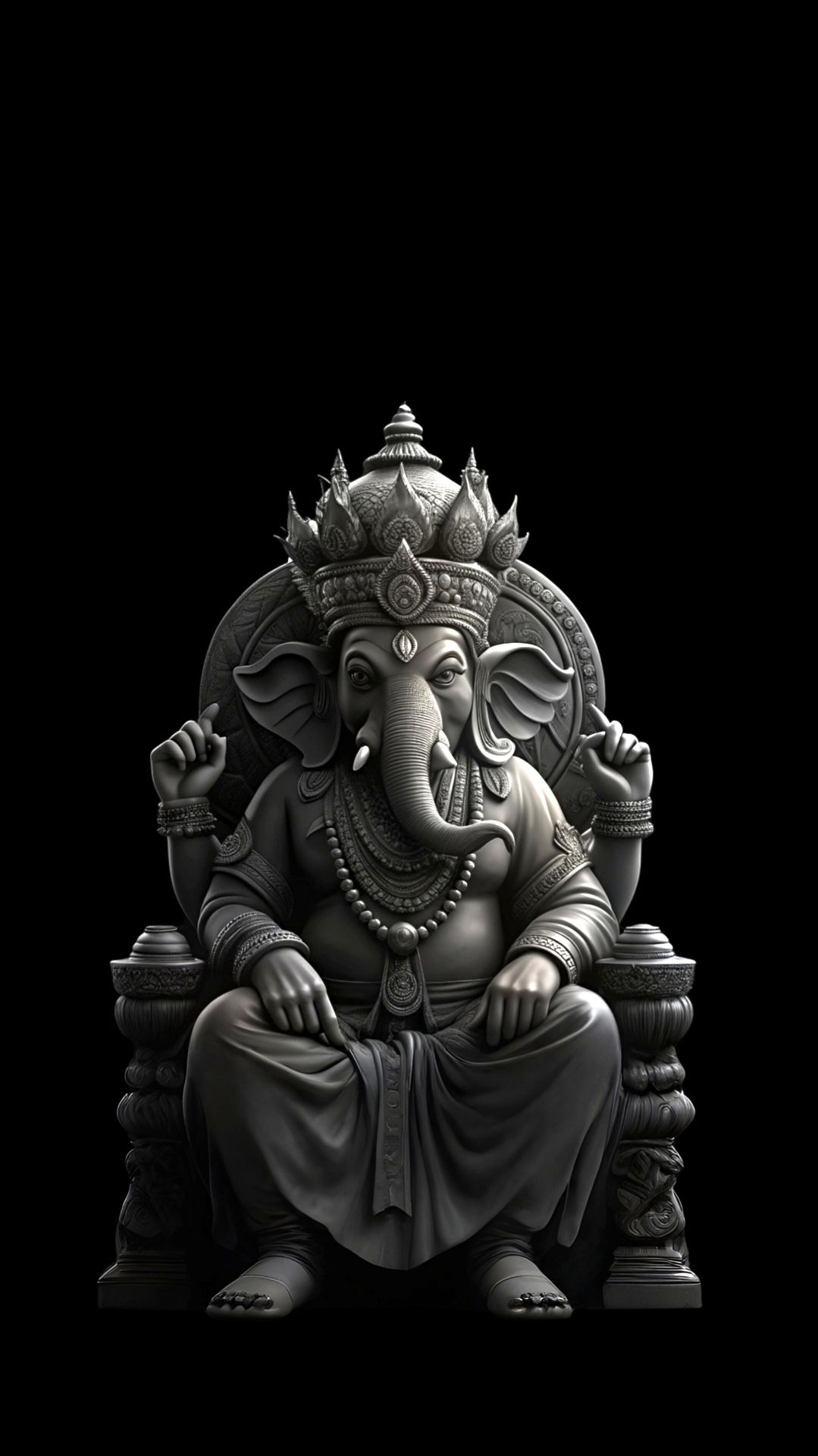 Silver Ganesha statue on ornate throne
