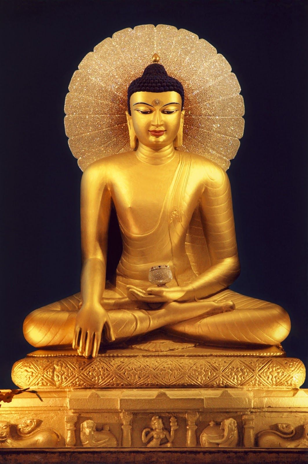 Golden Buddha in lotus position.