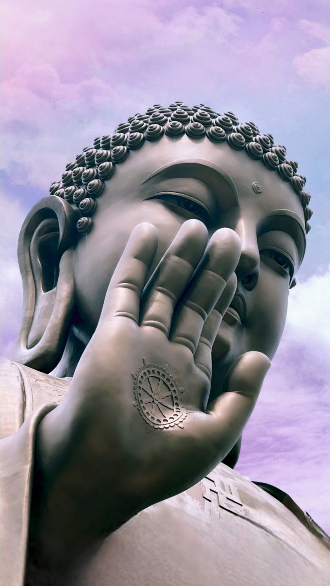 Buddha\'s peaceful face in close-up.