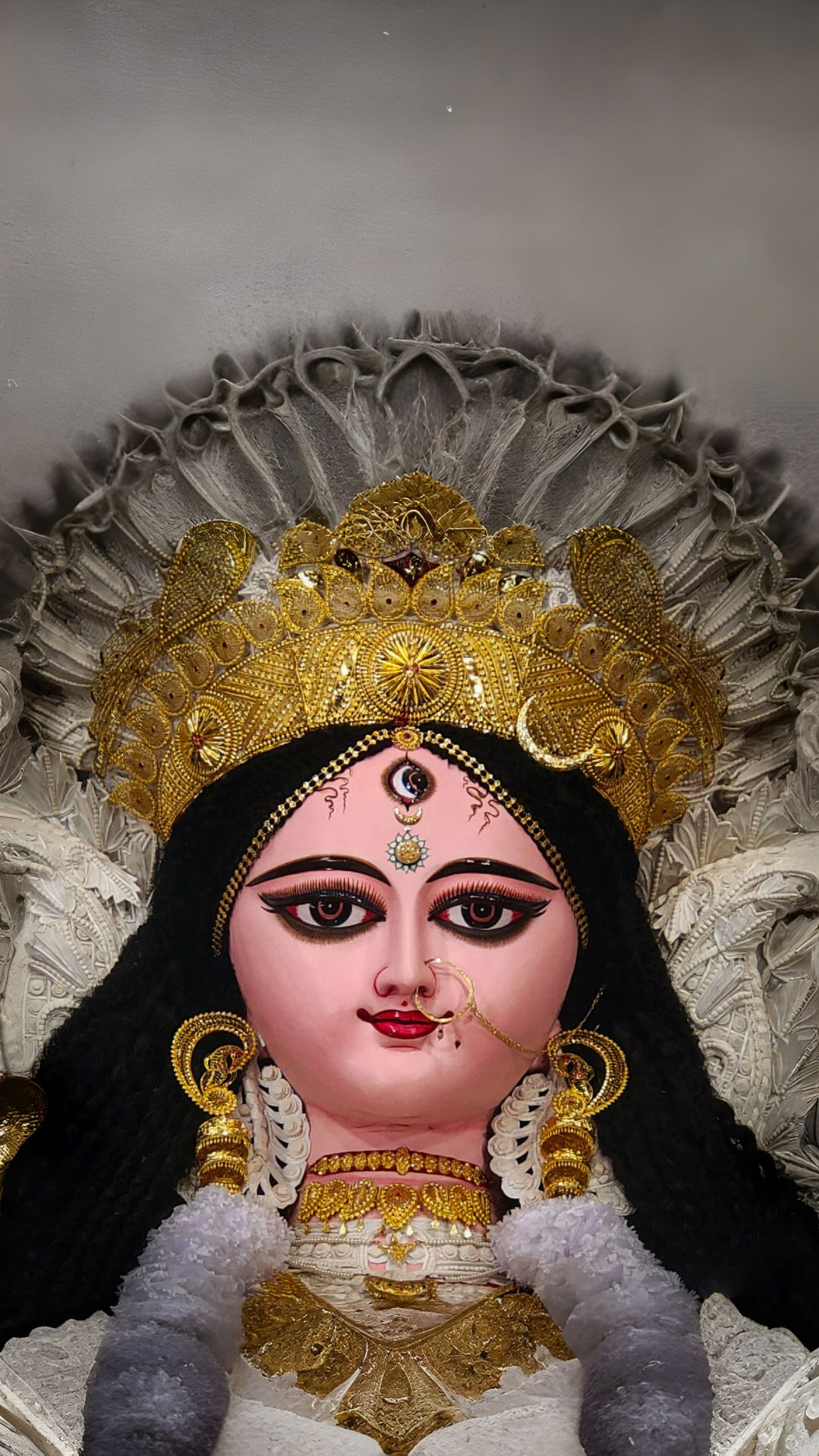 Goddess Durga\'s face with golden crown