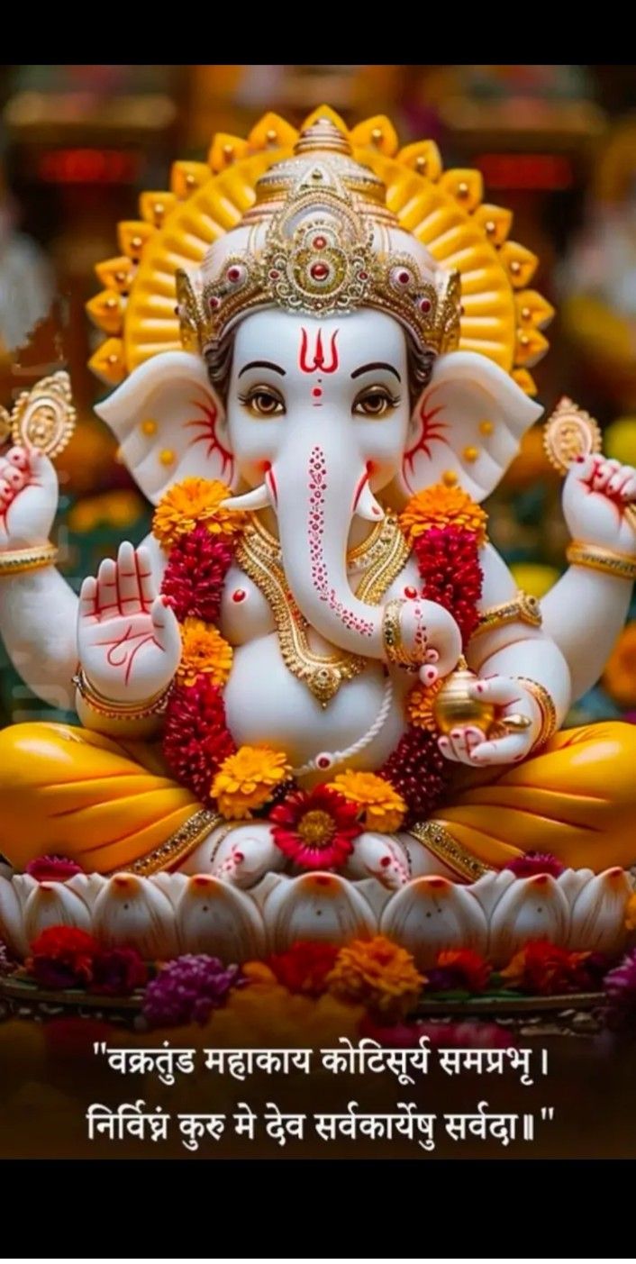 Lord Ganesha with flowers and mantra