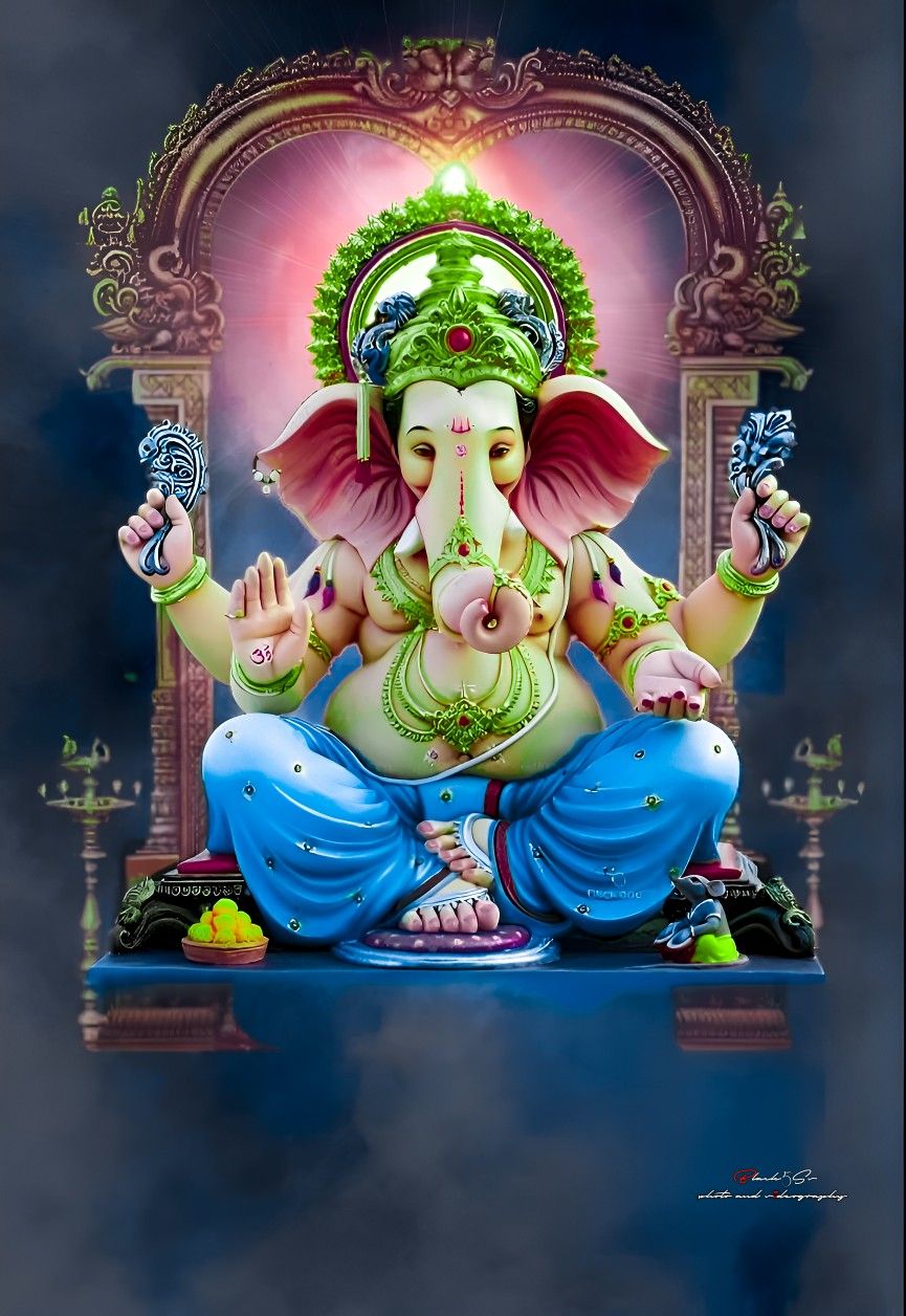 Lord Ganesha sitting in blessing pose