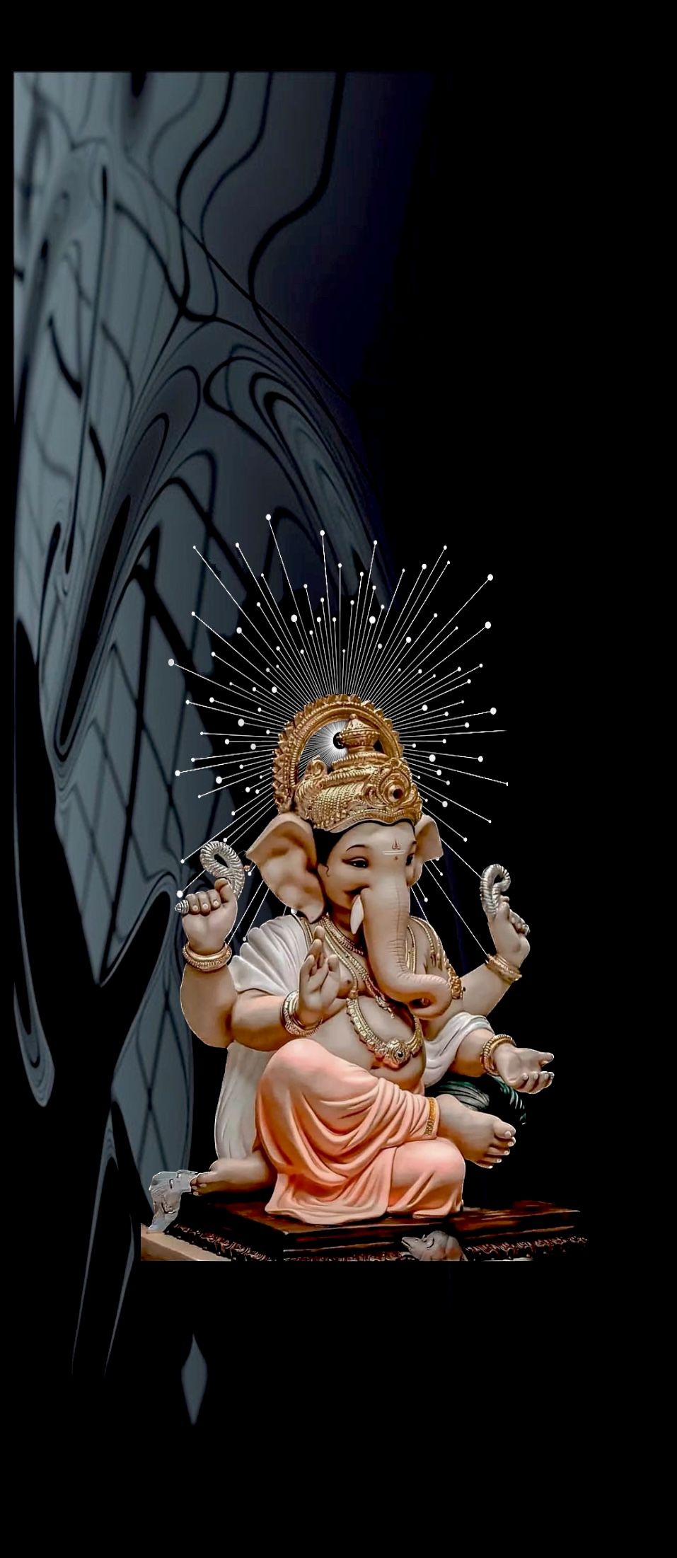 Lord Ganesha radiating golden light.
