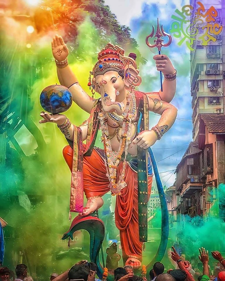 Ganesha rising above a city scene