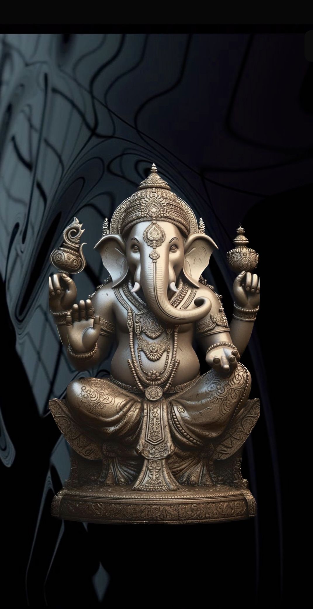 Golden Ganesha statue with blessings.