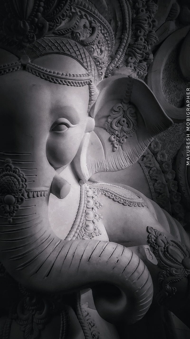 Grayscale sculpture of Lord Ganesha