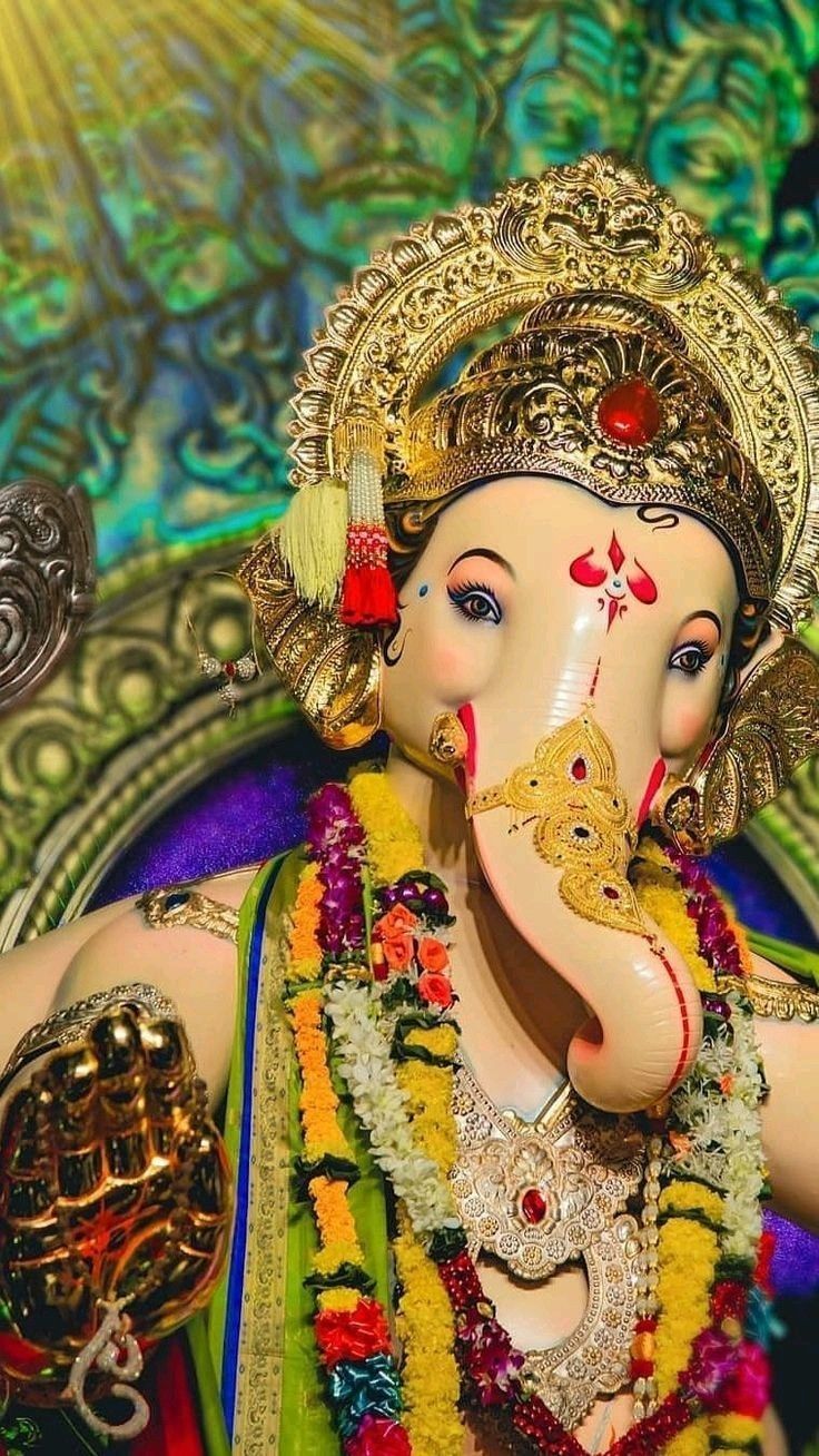 Close-up of decorated Ganesha idol.