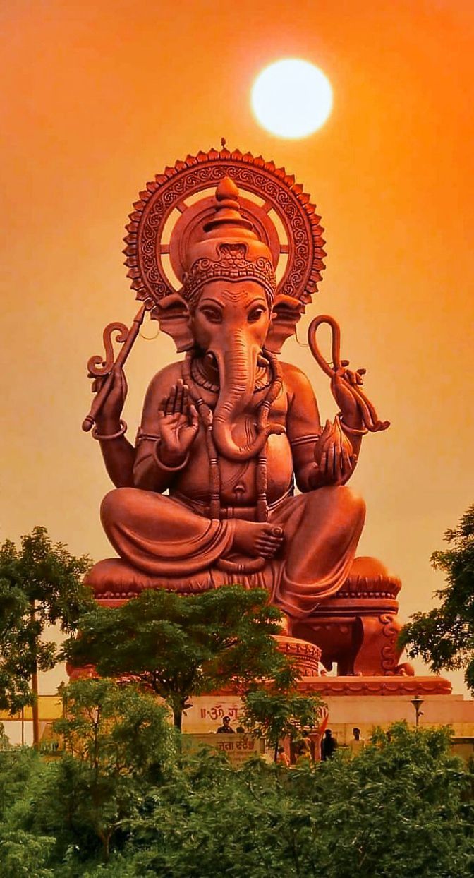 Lord Ganesha statue at sunset