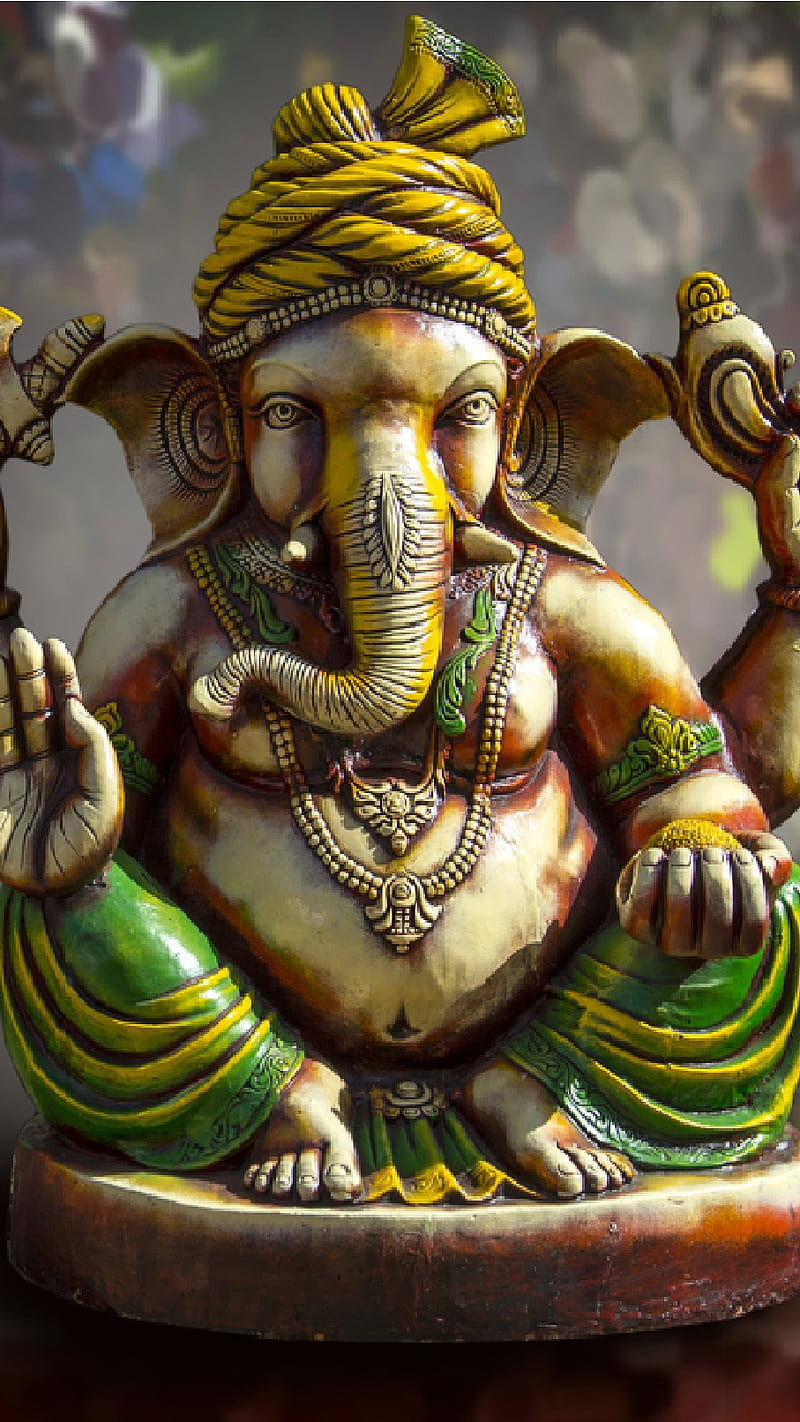 Golden Ganesha statue, blessings and wisdom