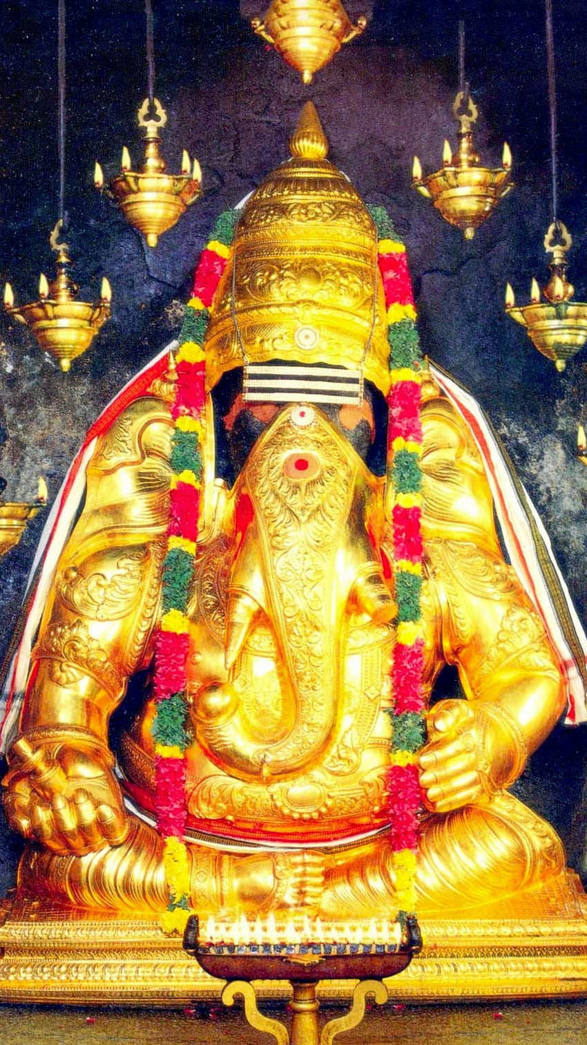 Golden Ganesha idol in a temple