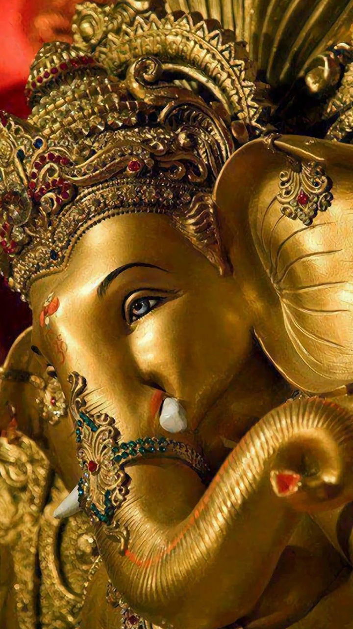 Golden Ganesha idol close-up view