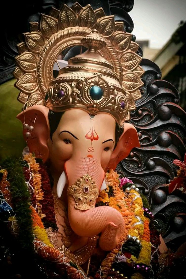 Close-up of golden Ganesha idol