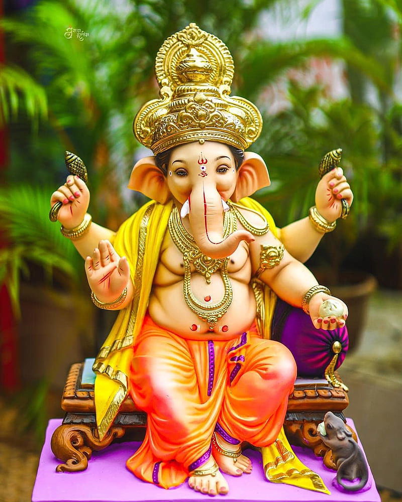 Lord Ganesha seated on a throne