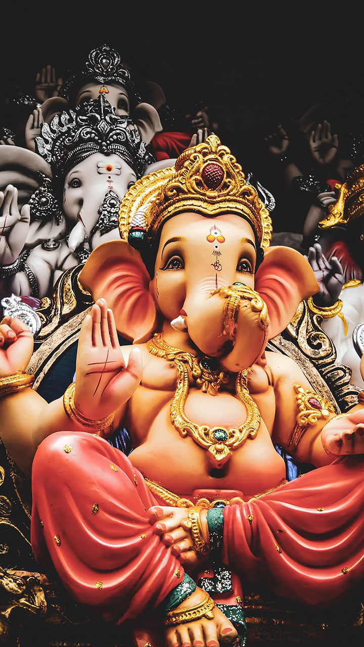 Close-up of golden Ganesha idol.