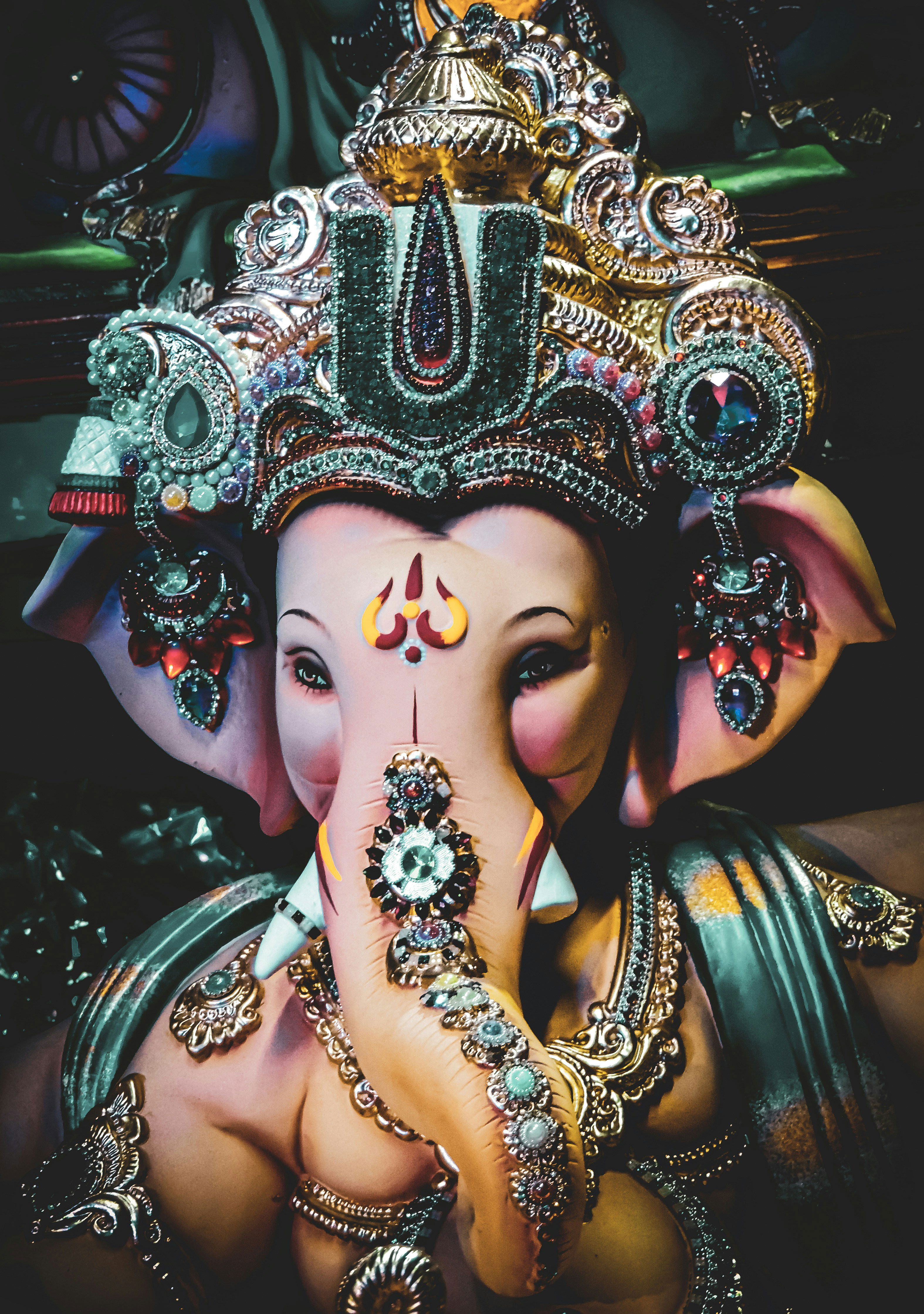 Close-up of intricately decorated Ganesha idol