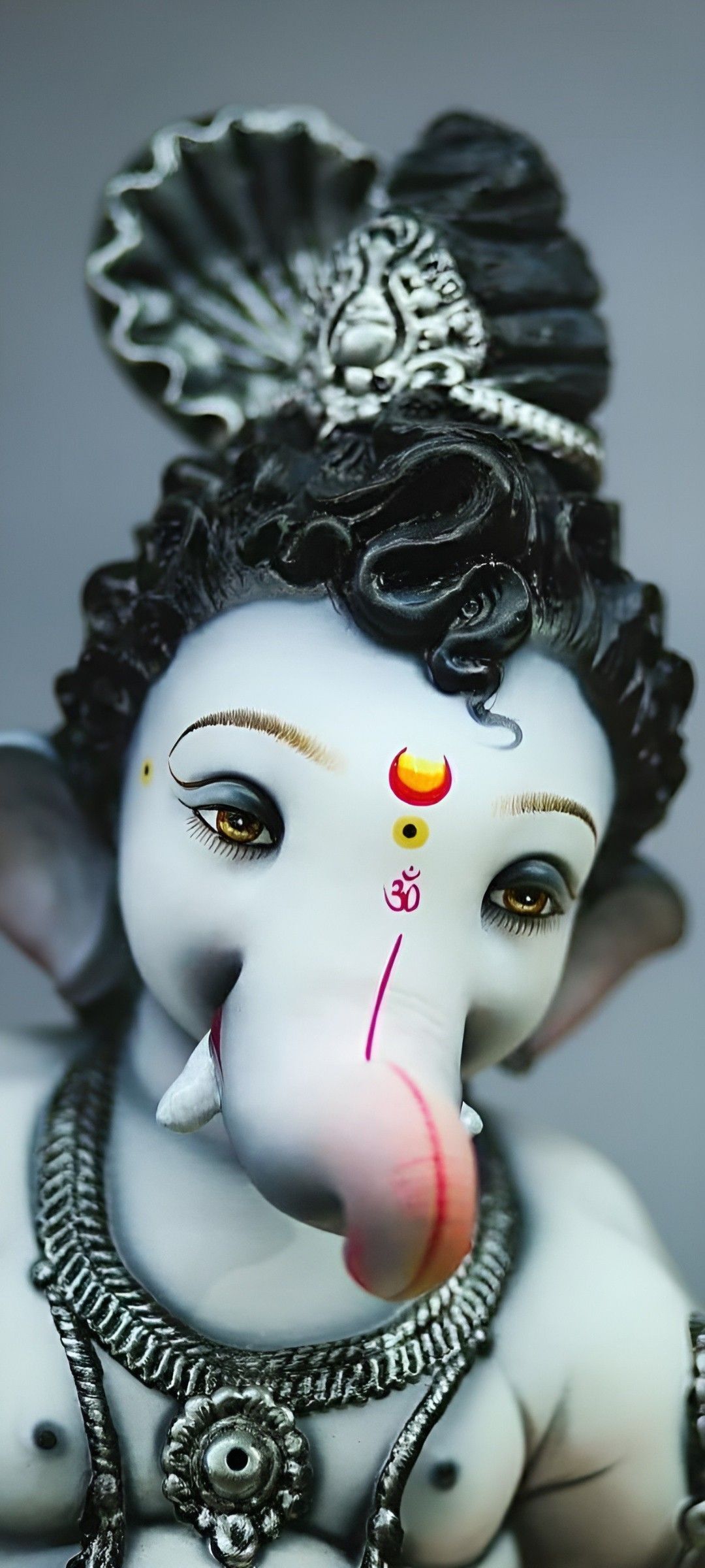 Close up of Lord Ganesha\'s face.