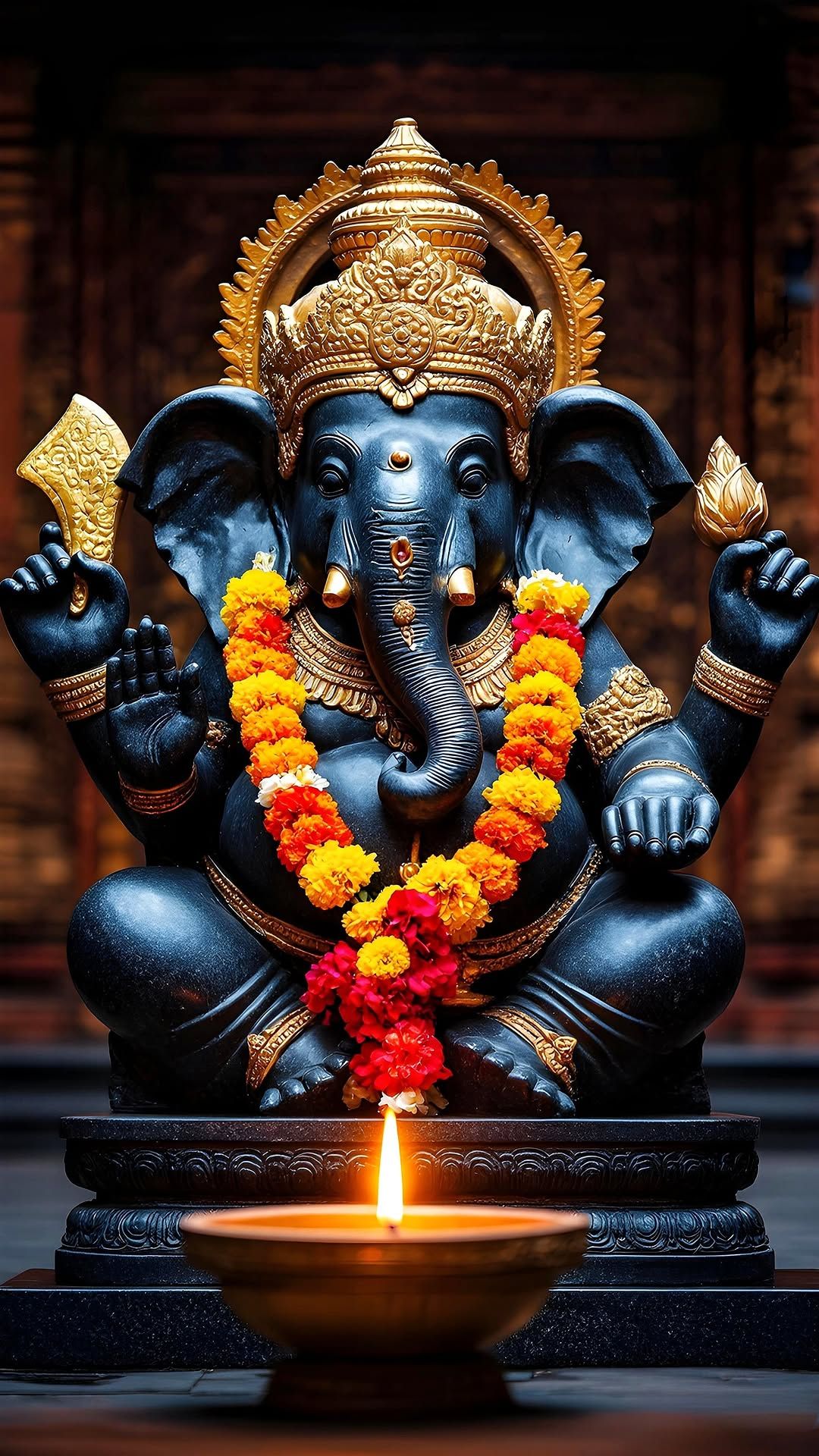 Lord Ganesha with a diya offering