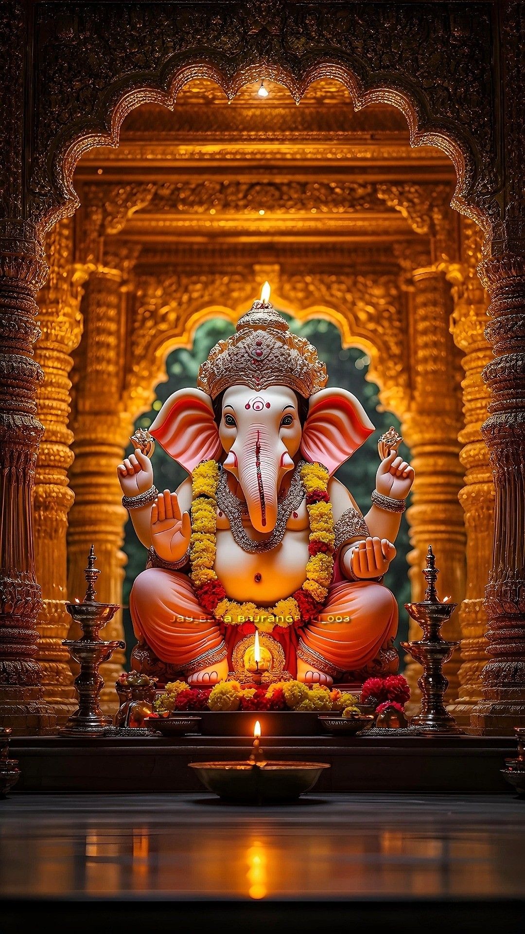 Golden Ganesha statue in ornate temple