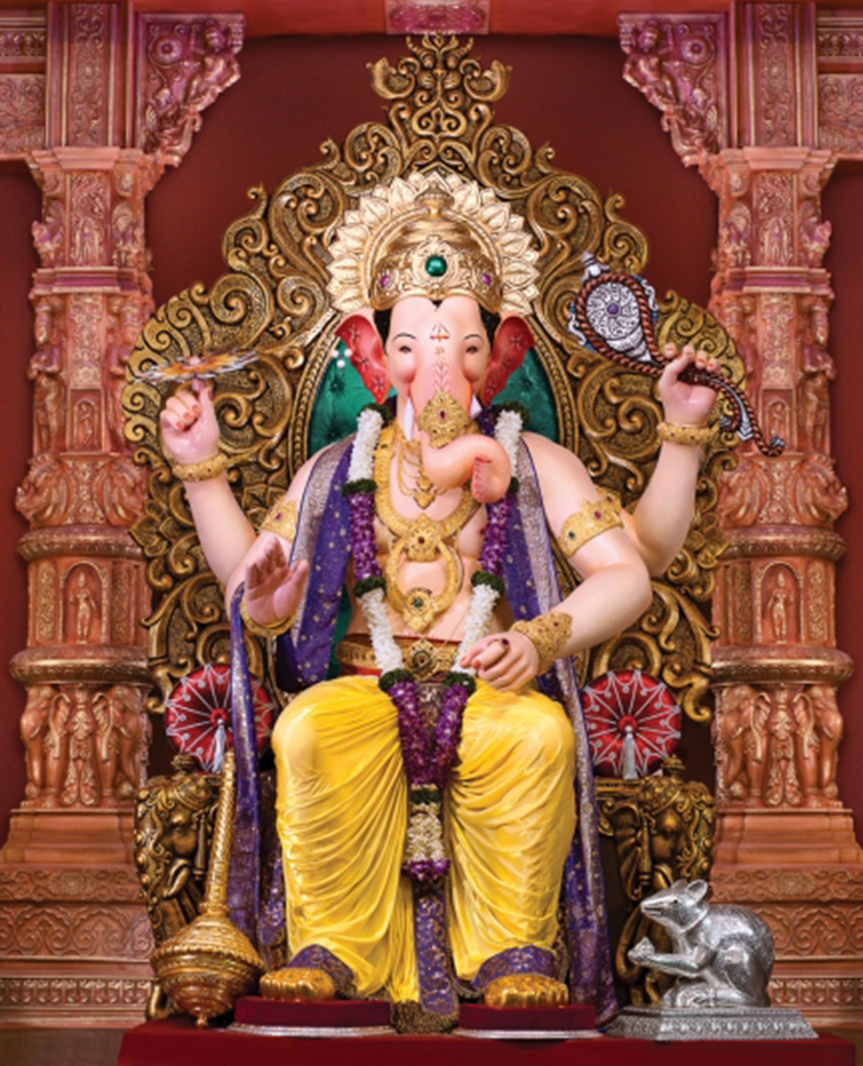 Golden Ganesha on ornate throne